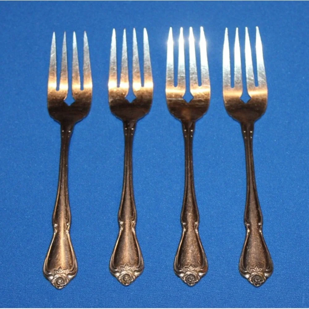 4 1881 Rogers stainless steel salad forks Oneida Ltd. Arbor Rose flatware lot